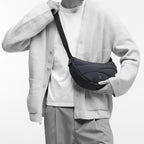 Wavy Puffer Moon Bag