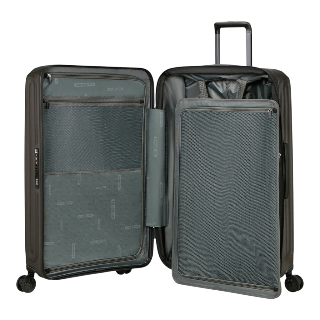 Lieblingstasche 2WANDER spinner suitcase interior with grey fabric lining, mesh pockets, and zippered compartments.