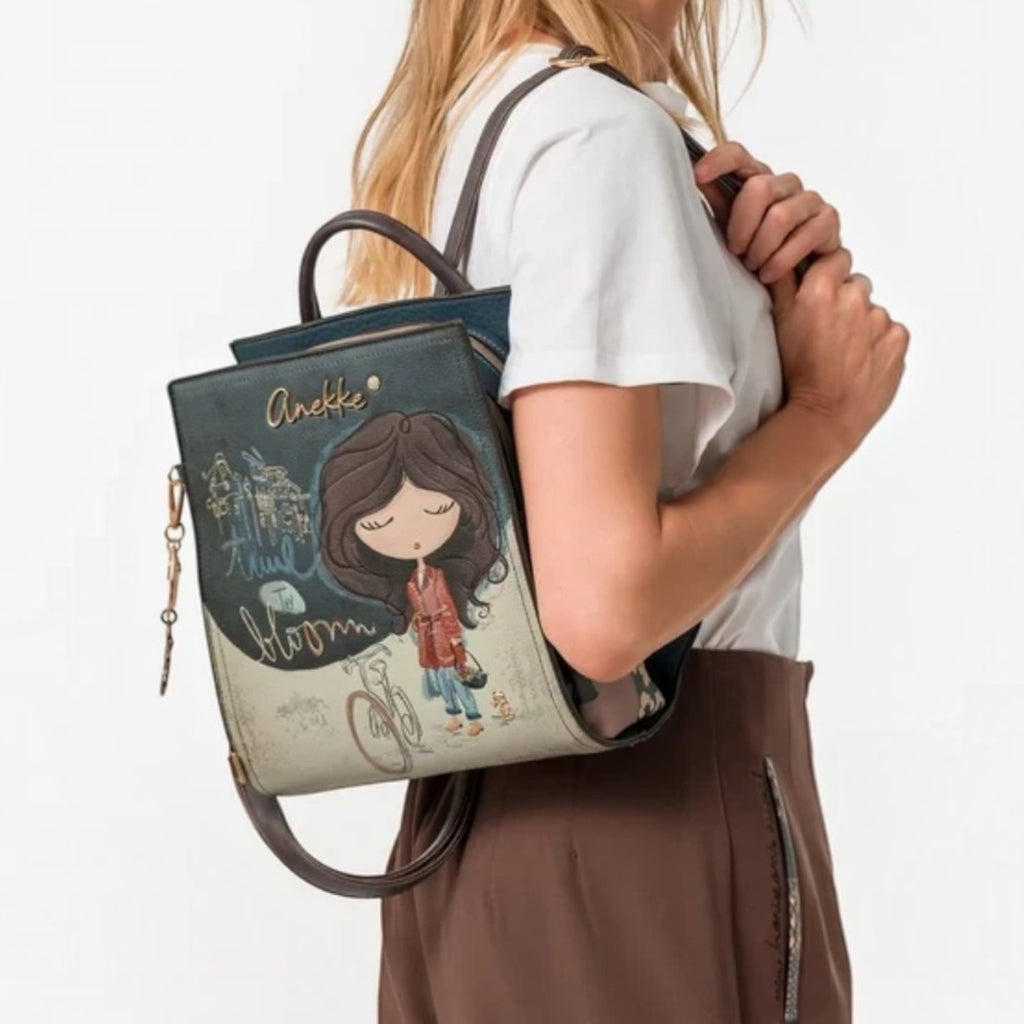 Lieblingstasche Anekke backpack with artistic illustration of a girl and bicycle on a blue and beige synthetic leather