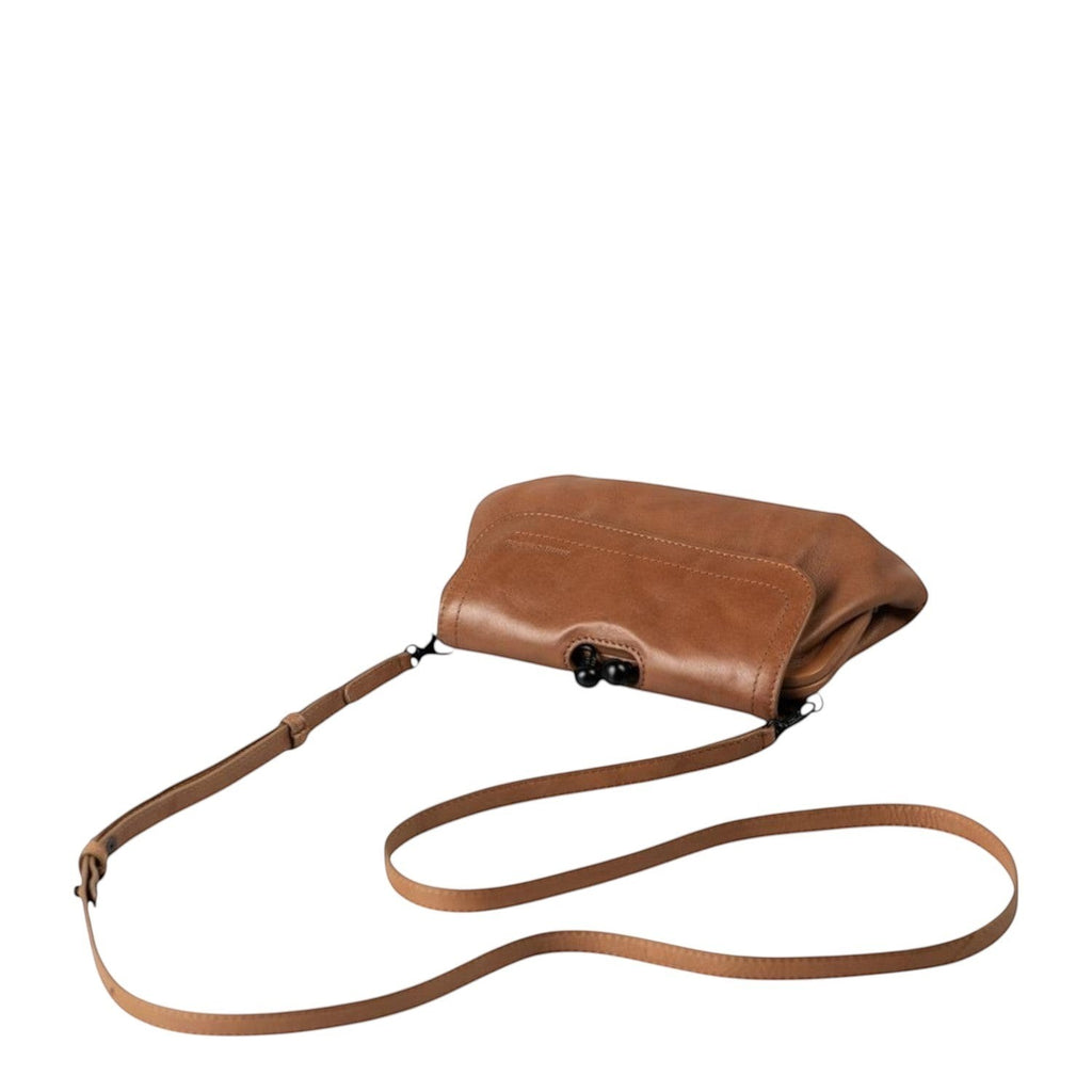 Lieblingstasche aunts & uncles Mrs. Whoopie Pie brown leather crossbody bag with a slim strap and clip closure