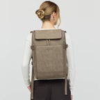 Lieblingstasche Bali Medium backpack in taupe worn on the back by a woman