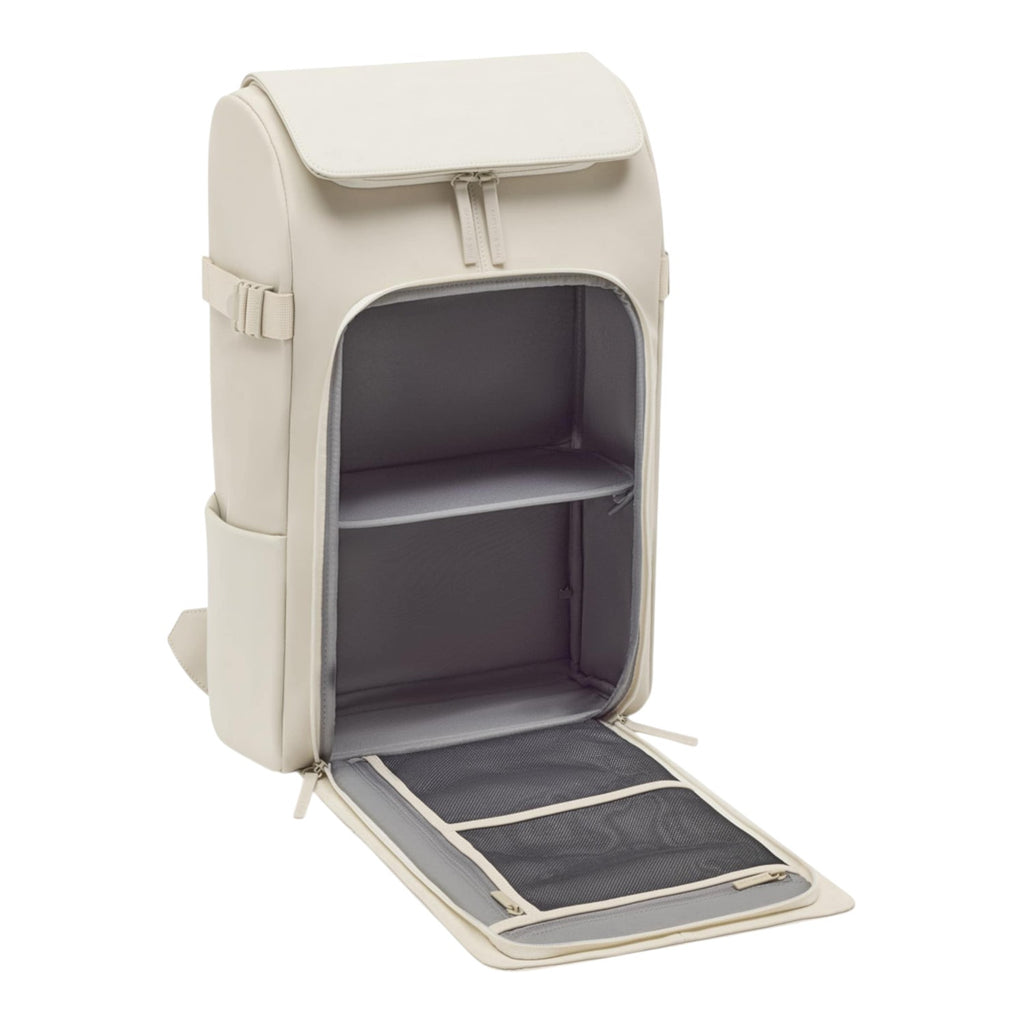 Lieblingstasche Bali Pro off-white backpack with open main compartment showing shelves and mesh pocket.