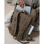 Lieblingstasche Bali Pro taupe backpack with padded straps, laptop sleeve, water bottle pocket, and phone side pocket.