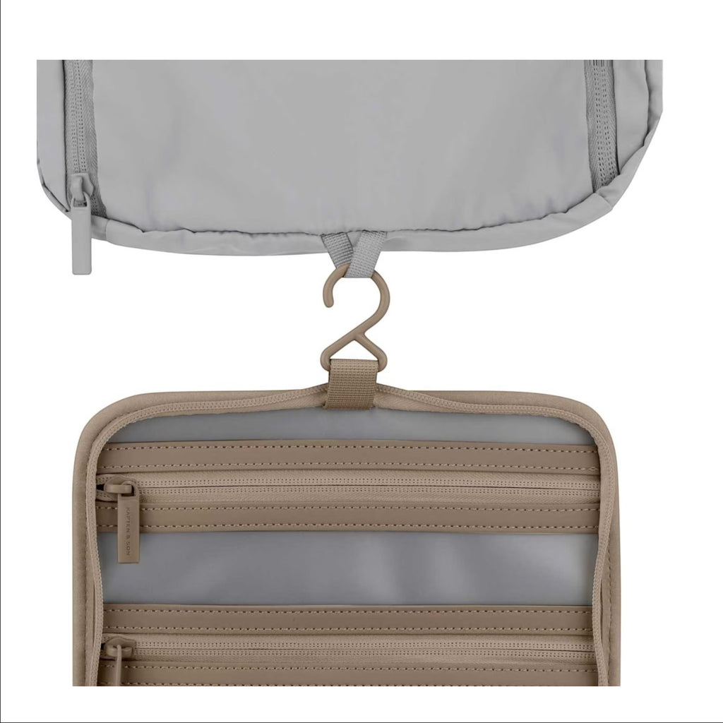 Lieblingstasche Bali washbag in beige and grey with multiple zippered compartments and a hanging hook