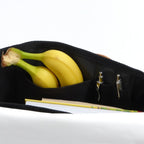 Lieblingstasche Barkasse Mini messenger bag interior showing black organizer pockets with pens and a notebook