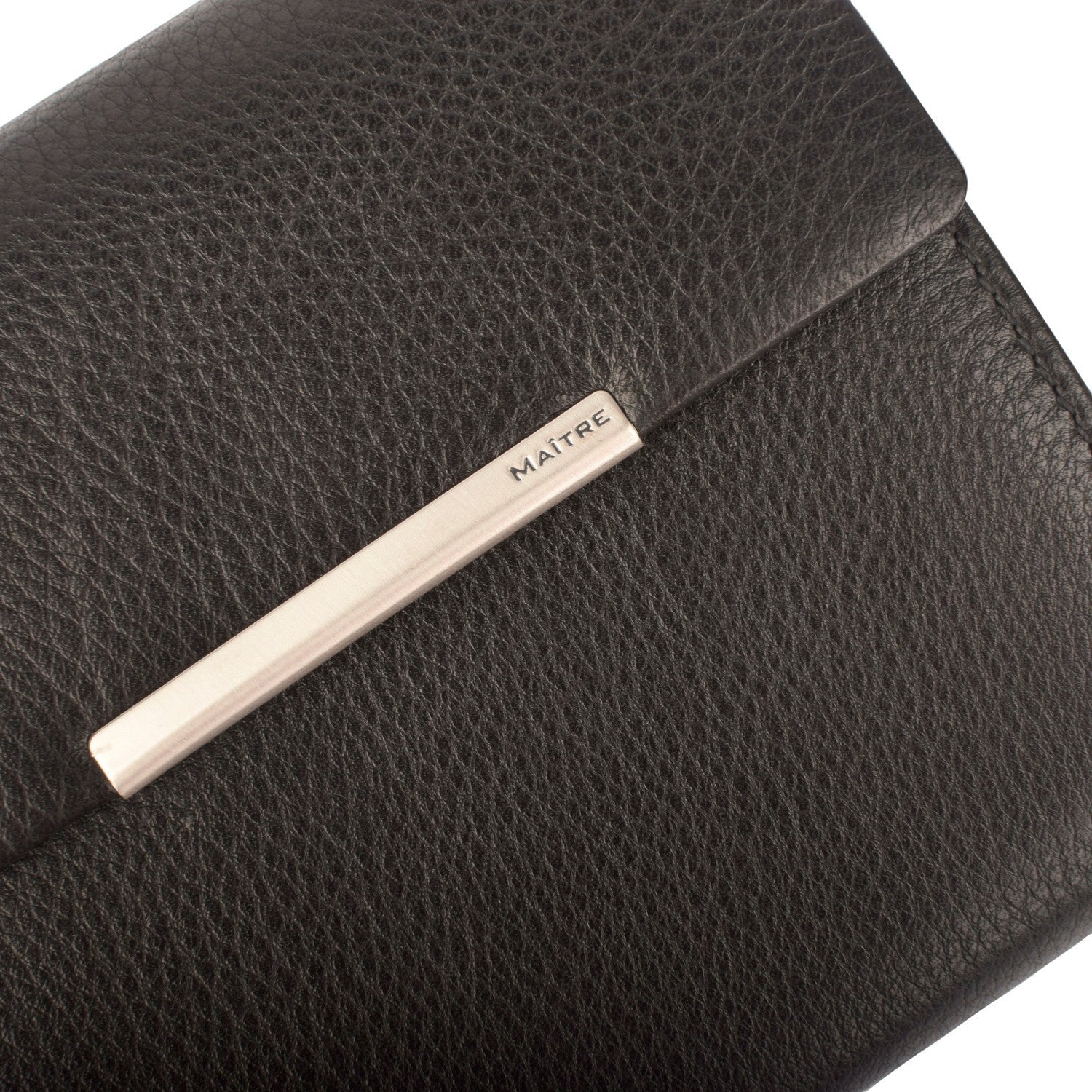 Lieblingstasche Belg Dartrud Purse MH11F black leather clutch with silver bar detail.