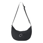 Lieblingstasche black crescent-shaped sling bag with an adjustable strap and silver carabiner detail
