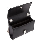 Lieblingstasche black pebbled leather Pochette Divina crossbody bag with silver hardware and chain strap.