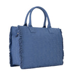 Lieblingstasche blue denim tote bag with all-over logo pattern and frayed edges.