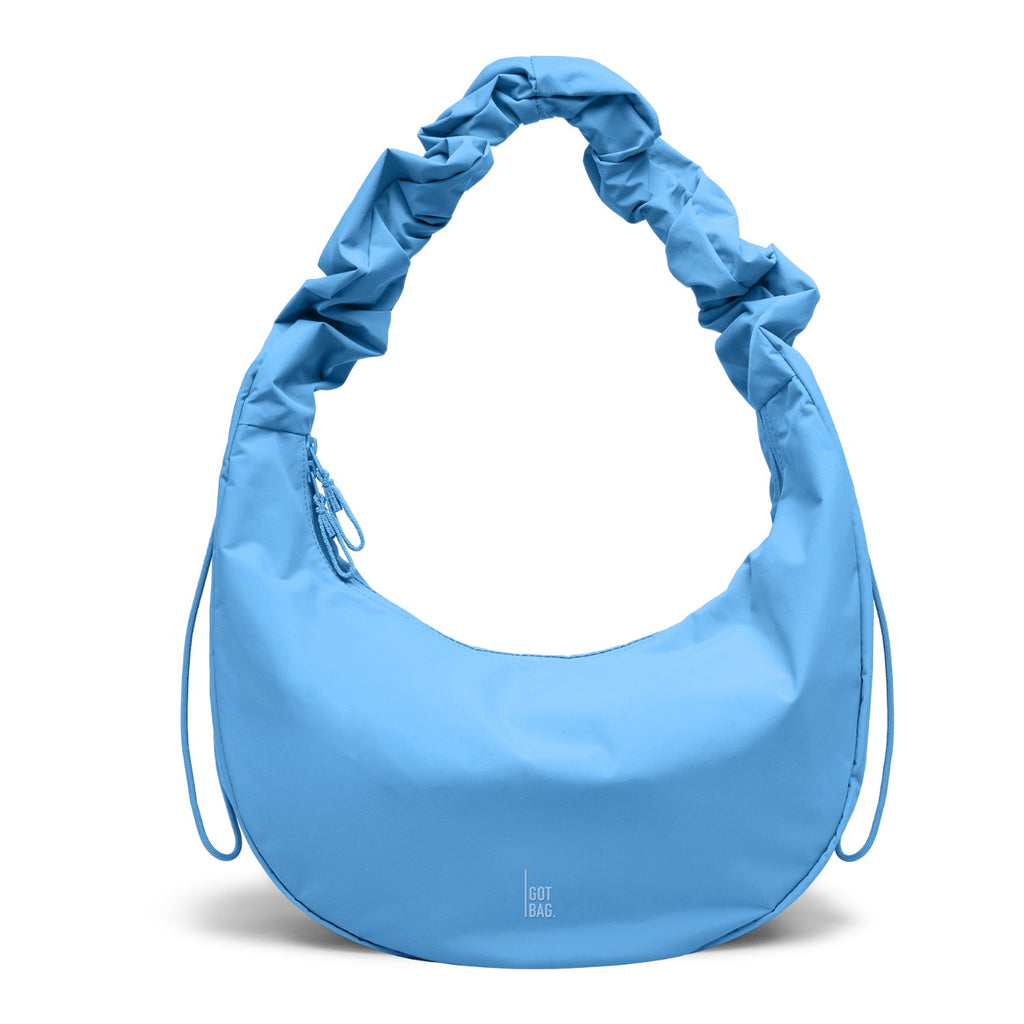 Lieblingstasche large blue moon bag with ruched strap and zipper detail.