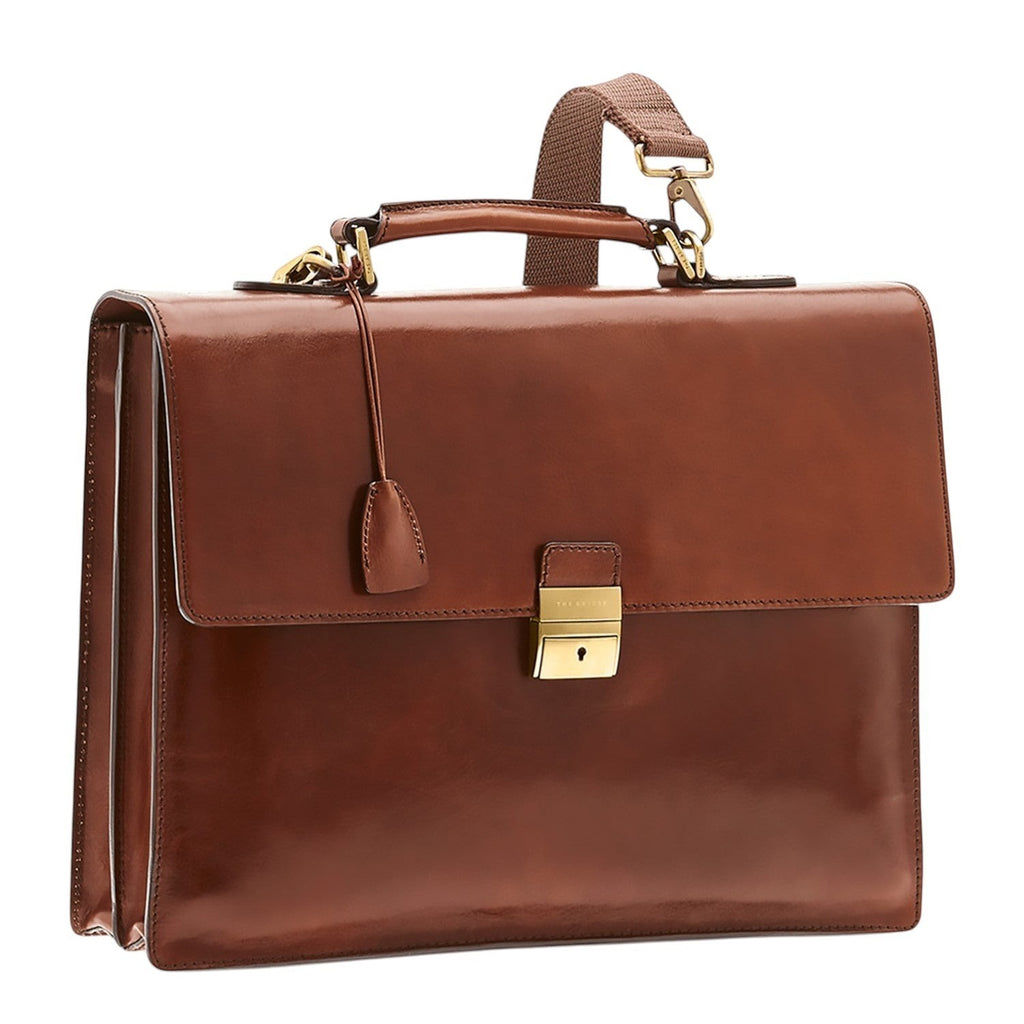 Lieblingstasche brown leather briefcase with gold hardware and detachable shoulder strap.