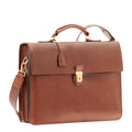 Lieblingstasche brown leather briefcase with top handles, a detachable shoulder strap, and a gold-tone key lock closure.