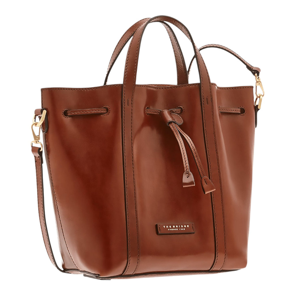 Lieblingstasche brown leather bucket bag with drawstring closure and top handles.