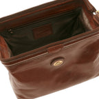 Lieblingstasche brown leather dopp kit with gold logo detail and zippered main compartment.