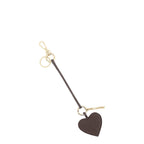 Lieblingstasche heart charm in dark brown leather with gold-tone hardware and a small logo tag on a key ring