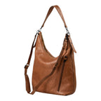 Lieblingstasche Mrs. Banoffee Pie brown leather hobo bag with adjustable shoulder strap and side zipper detail