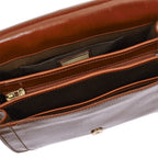 Lieblingstasche brown leather shoulder bag with multiple compartments and gold zipper detail.