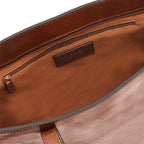 Lieblingstasche brown leather tote bag interior with zip pocket and branded label.