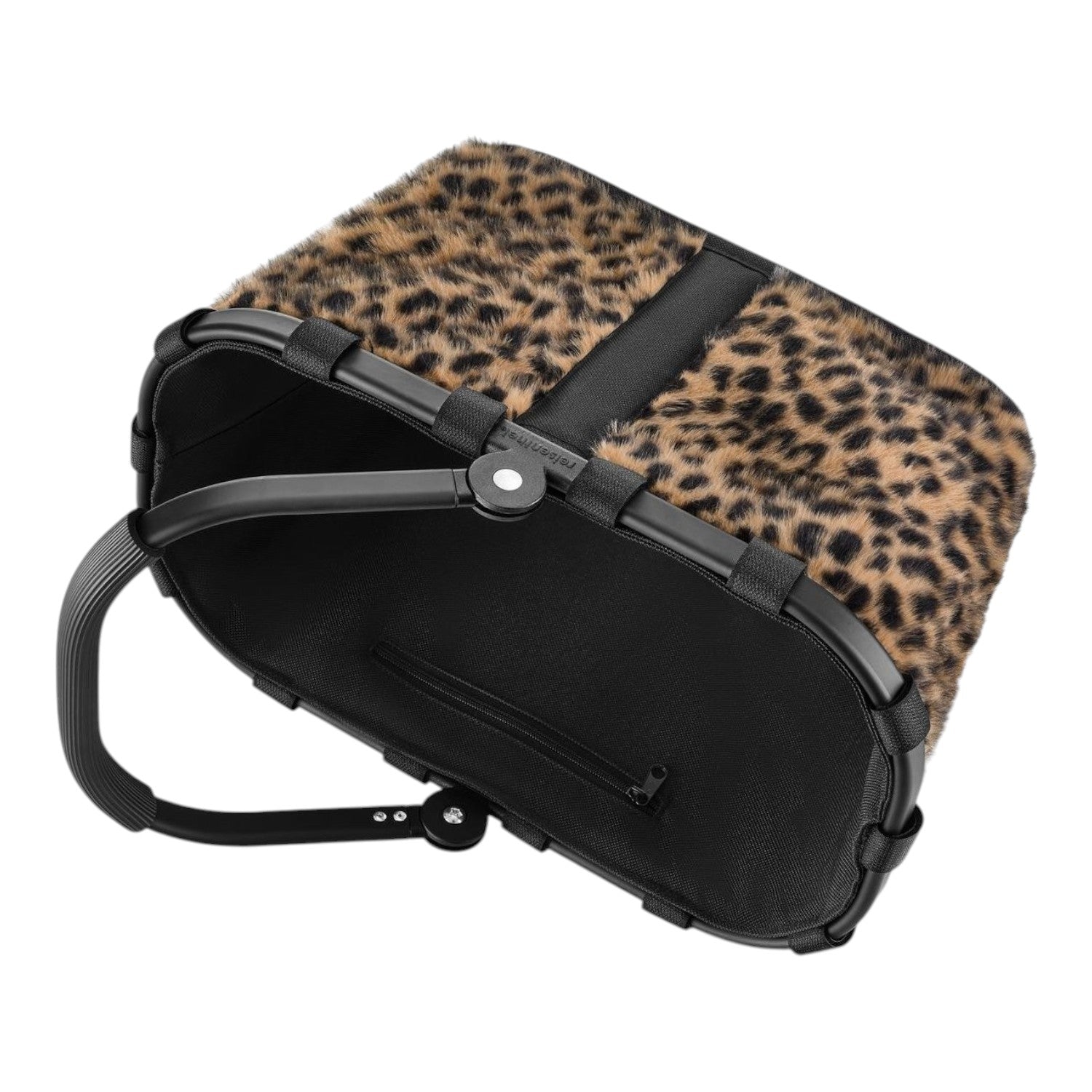 Lieblingstasche Carrybag XS featuring a leopard print faux fur exterior and black interior with a sturdy handle.