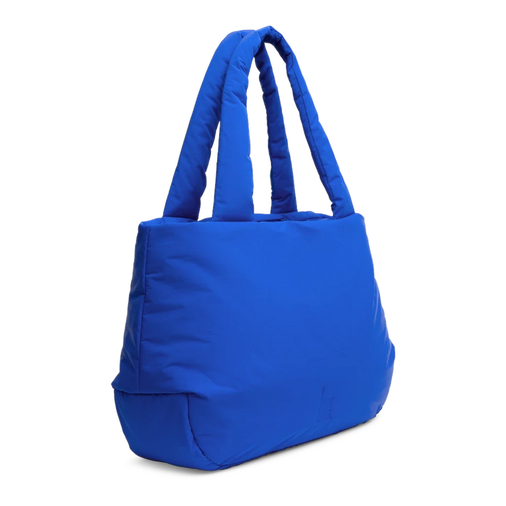 Lieblingstasche Cloud Horizon tote bag in vibrant blue with a soft, padded quilted finish and comfortable handles.