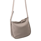 Lieblingstasche Coral taupe leather crossbody bag with a soft slouchy silhouette and adjustable shoulder strap.