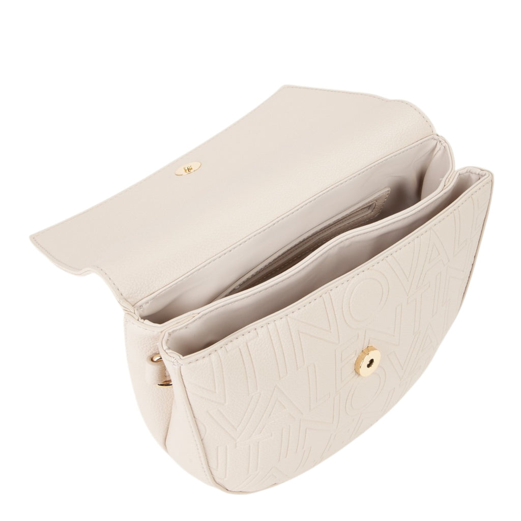 Lieblingstasche cream leather flap bag with embossed logo and gold hardware.