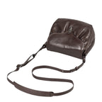 Lieblingstasche Mrs. Coconut Cake dark brown leather crossbody bag with a flap closure and adjustable shoulder strap.