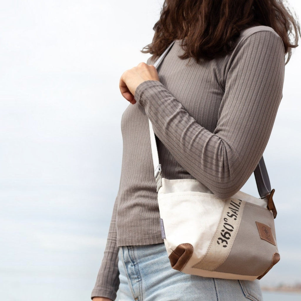 Lieblingstasche Deern Lütt crossbody bag made from recycled white and grey sailcloth with brown leather accents