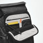 Lieblingstasche eoto Tall41 black rolltop backpack showing the open front organizer pocket with mesh and pen slots