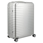 Lieblingstasche Eternity L silver aluminium suitcase with ribbed texture, leather handles, and spinner wheels.
