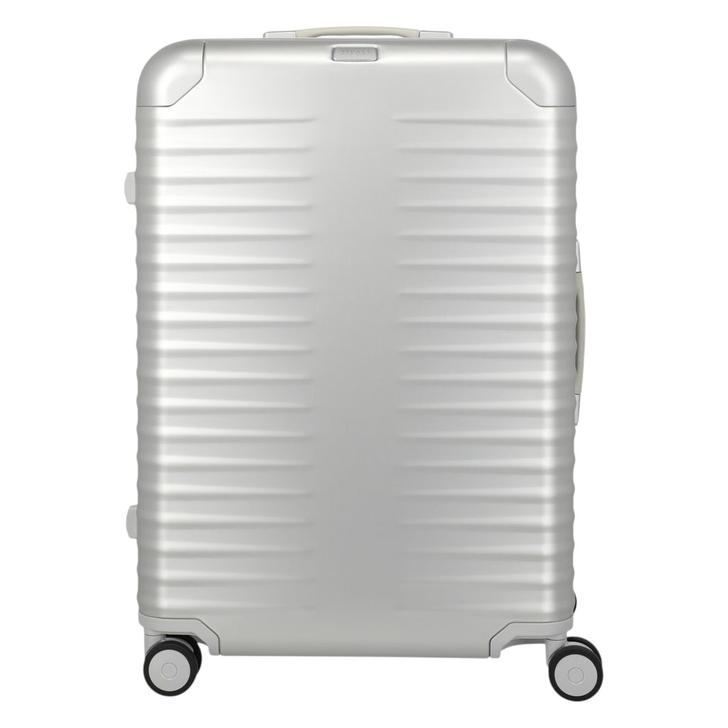 Lieblingstasche Eternity 4W Trolley L silver aluminium suitcase with ribbed texture, leather handles, and spinner wheels.