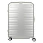 Lieblingstasche Eternity 4W Trolley L silver aluminium suitcase with ribbed texture, leather handles, and spinner wheels.