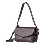 Lieblingstasche Fern dark brown leather shoulder bag with a flap closure and adjustable strap
