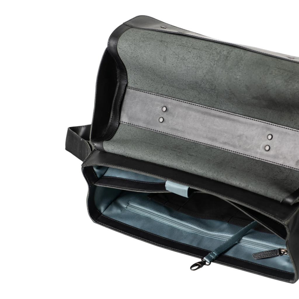Lieblingstasche Finn black leather messenger bag interior with blue lining and zippered pocket