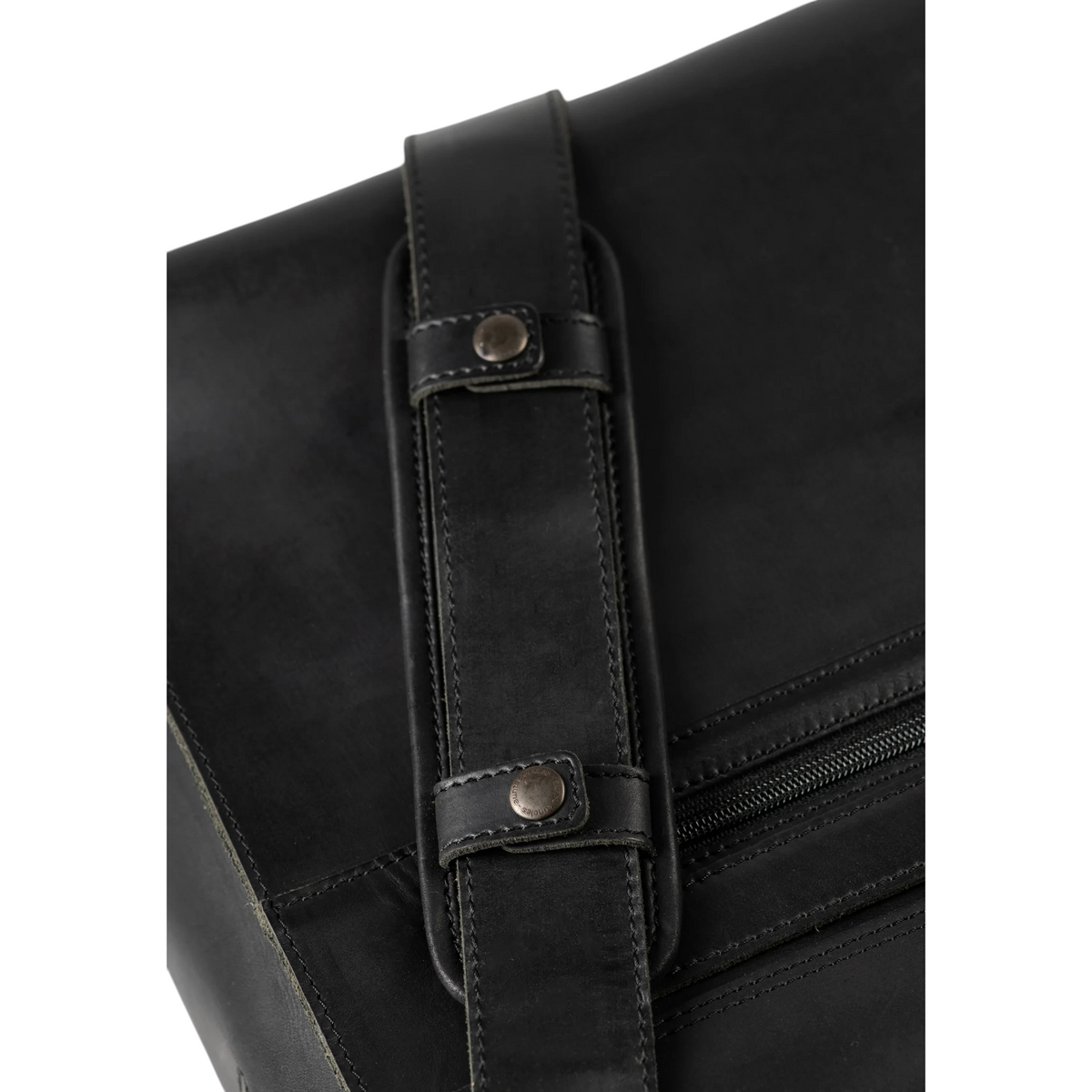 Lieblingstasche Finn black leather bag strap detail with metal rivets and reinforced stitching