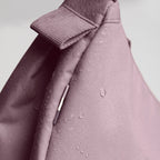 Lieblingstasche GOT BAG Moon Bag Small in dusty pink with water-repellent fabric texture and close-up detail.