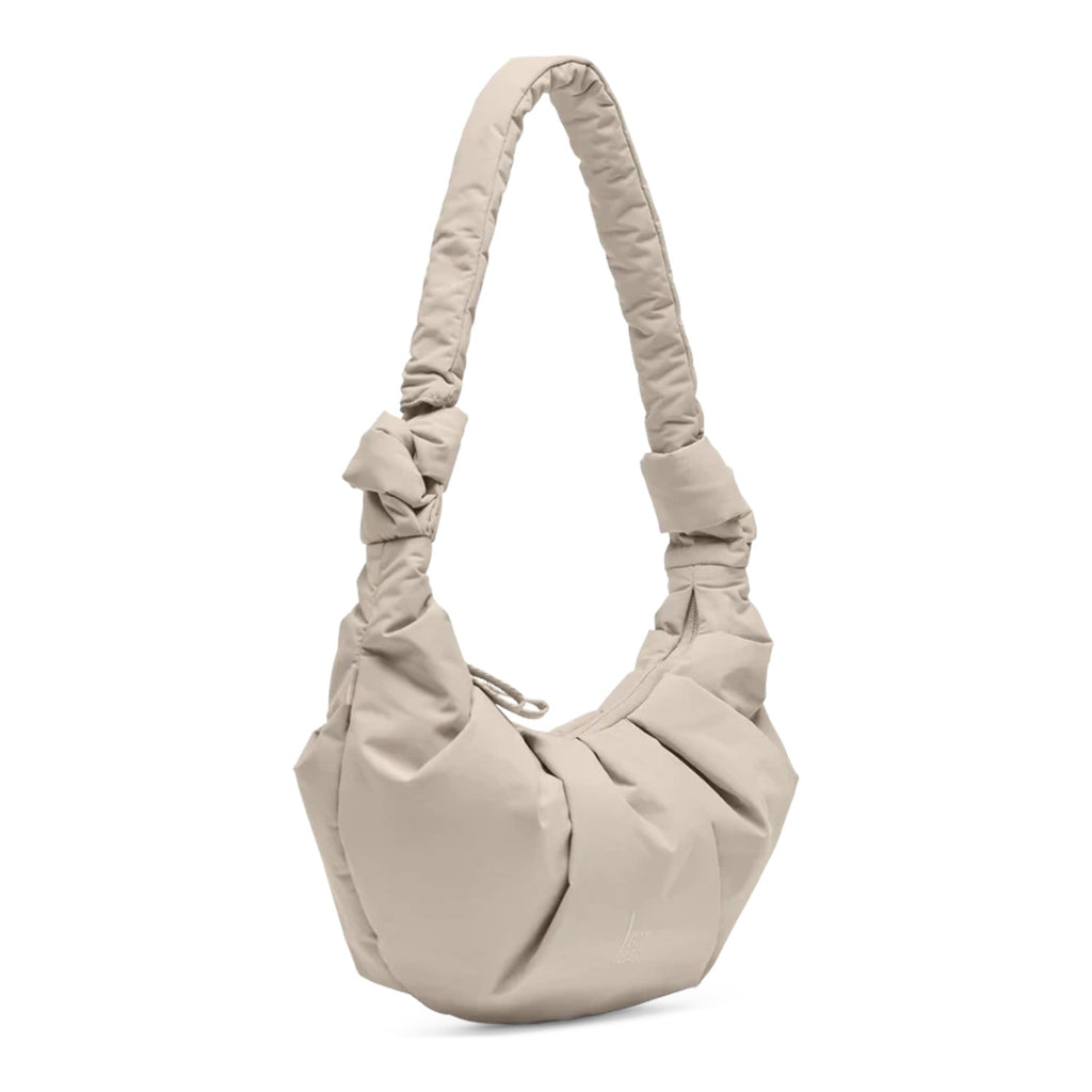 Lieblingstasche GOT BAG Pleat Moon Bag Small in beige, a compact, water-resistant recycled shoulder bag.