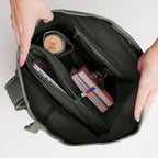 Lieblingstasche GOT BAG Rolltop 2.0 backpack interior showing laptop sleeve, water bottle, and organized compartments.