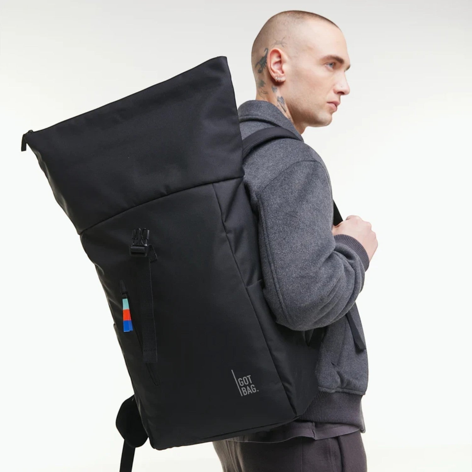 Lieblingstasche GOT BAG Rolltop Easy backpack in black, worn by a man, featuring a soft, water-repellent design.