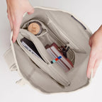 Lieblingstasche GOT BAG Rolltop Lite 2.0 backpack interior showing laptop sleeve, water bottle, and organized pockets