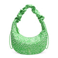 Lieblingstasche Moon Bag Ruffle Large in green leopard print with a gathered scrunchie-style shoulder strap.