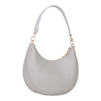 Lieblingstasche Alexia grey pebbled leather hobo bag with gold hardware and a single shoulder strap.