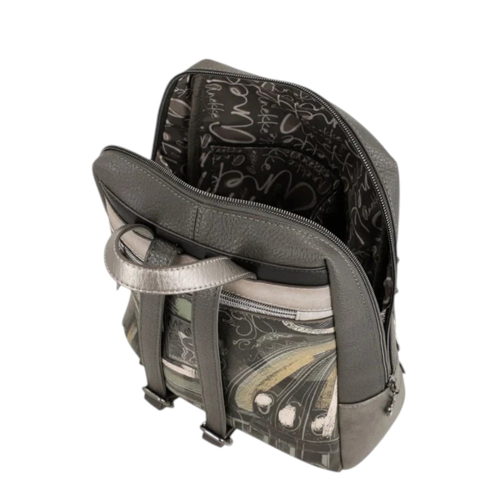 Lieblingstasche backpack in grey with a patterned interior lining and metallic silver accents