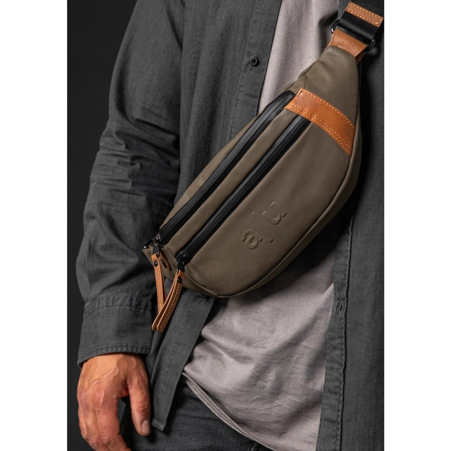 Lieblingstasche a/u by aunts & uncles Ichikawa belt bag in olive green coated canvas with brown leather details