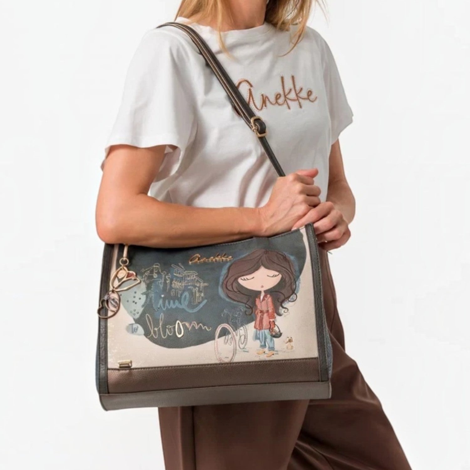 Lieblingstasche shoulder bag featuring a whimsical illustrated girl design with metallic accents and adjustable strap