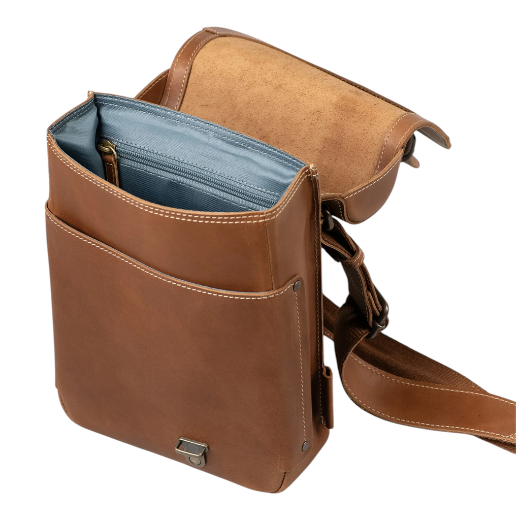 Lieblingstasche Jade brown leather backpack with open flap and blue interior lining