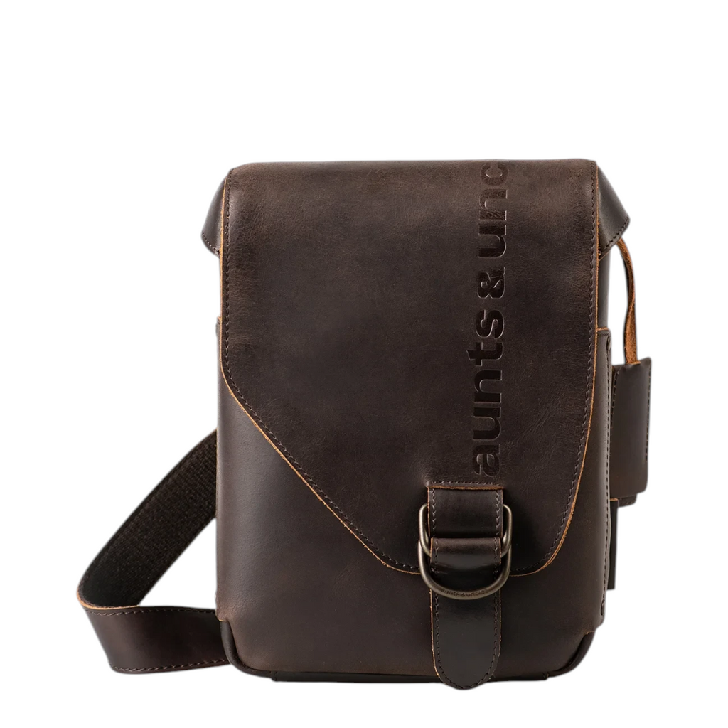 Lieblingstasche Jade dark brown leather crossbody bag with flap closure and embossed aunts & uncles logo