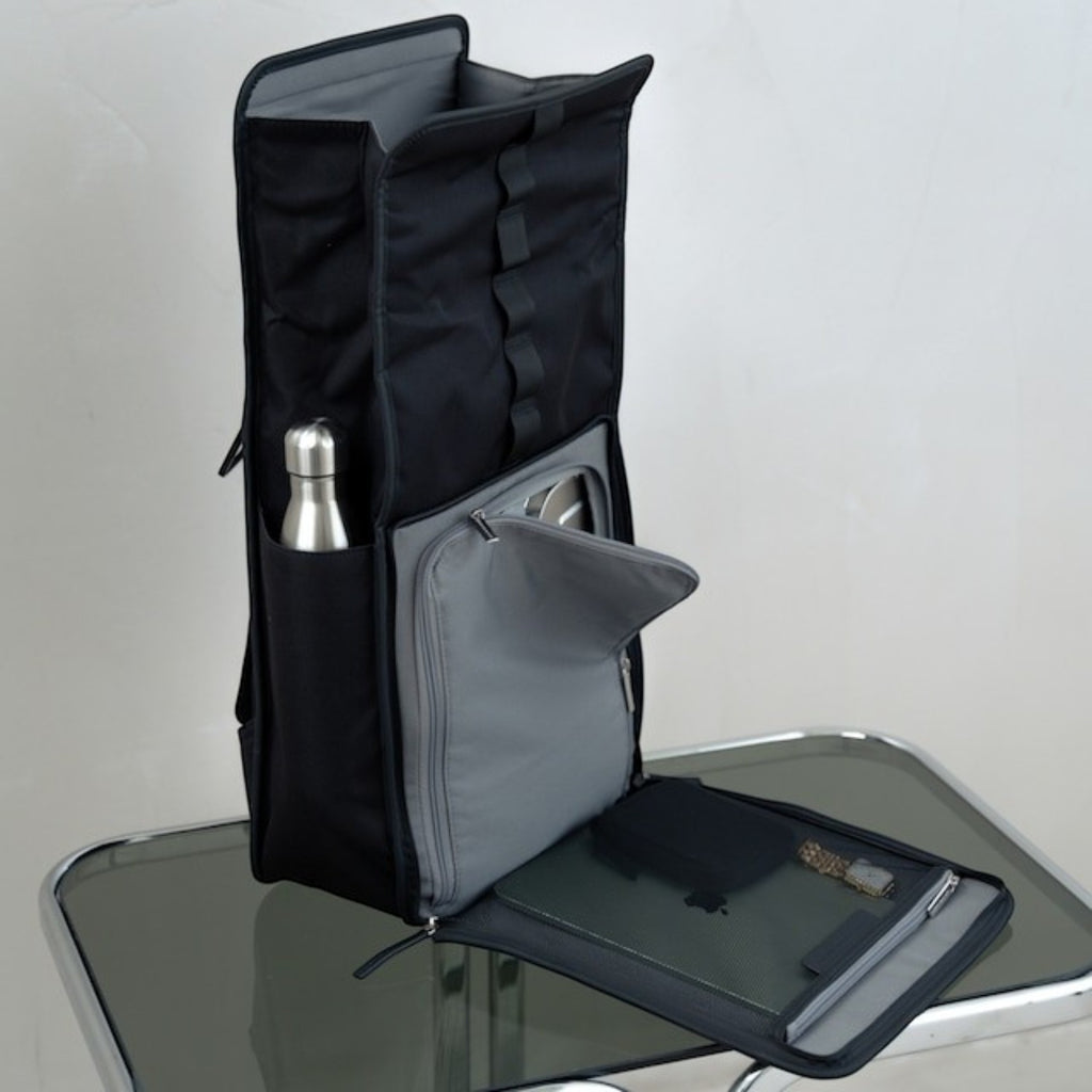 Lieblingstasche Kapten & Son Lund Pro black backpack with open flap, side bottle pocket, and laptop compartment access