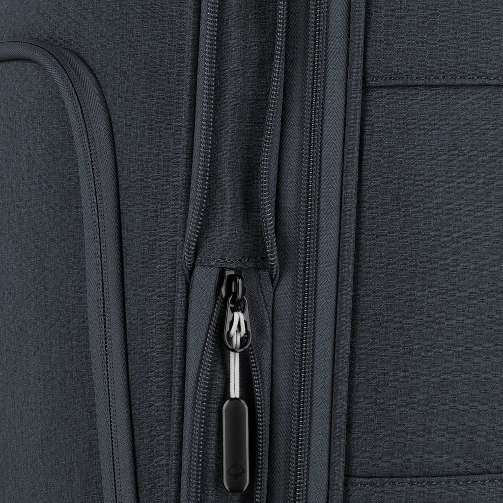 Close-up of the dark grey fabric and zipper detail on a Lieblingstasche KICK OFF expandable 4-wheel trolley suitcase.