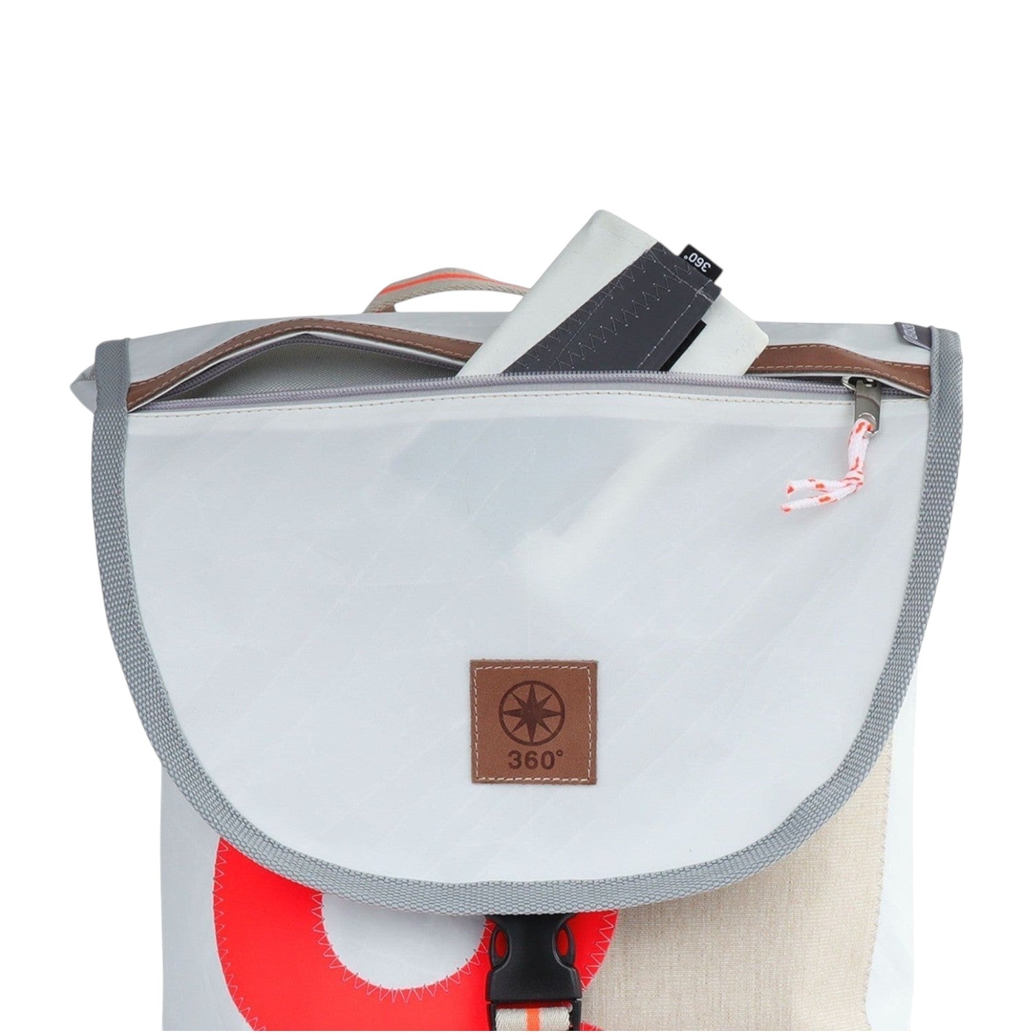 Lieblingstasche Landgang Mini backpack in white sailcloth with a brown leather logo patch and grey trim.